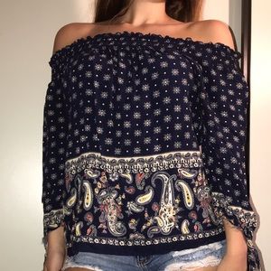 Patterned off the shoulder blouse.